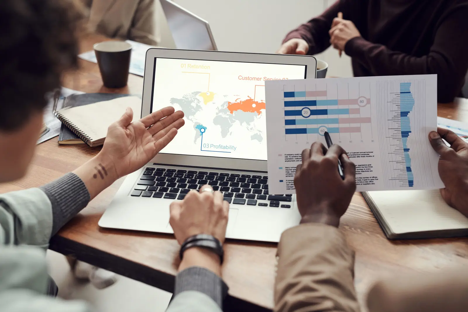 Analyst reviewing international market data and commercial intelligence